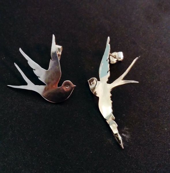Pierced bird earrings made in one day at the silver jewellery workshop Wales