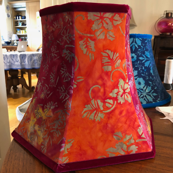 Traditional handmade tailored lampshade in red/orange batik & velvet trimming