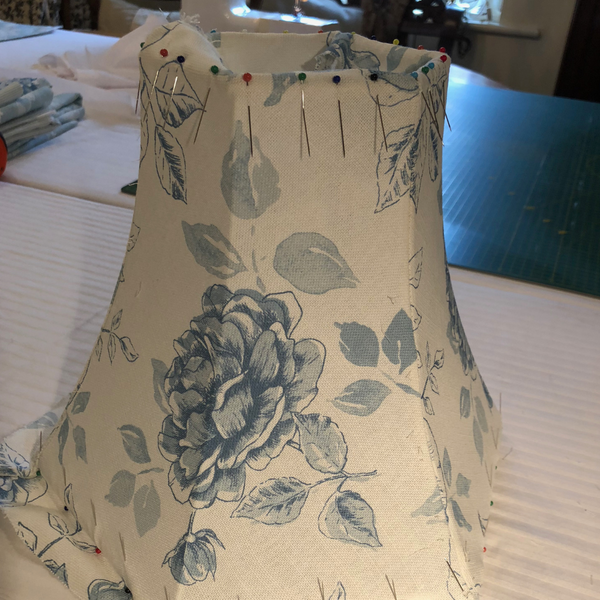 Pinning and stretching the bias on a cute cotton floral tailored lampshade