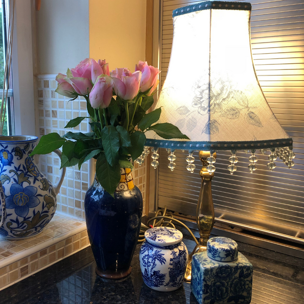 Cute cotton floral tailored lampshade with a dropdown beaded trim