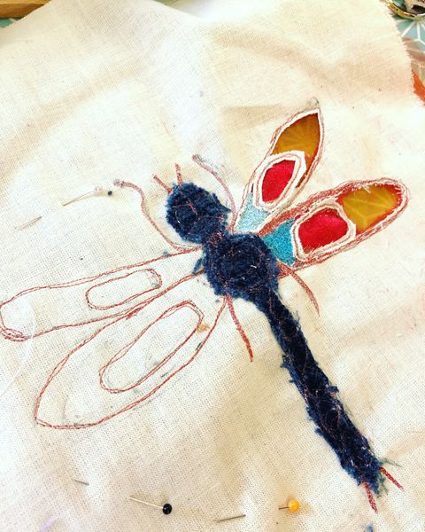 Reverse appliqué and free-machine embroidered dragonfly by Evelyn
