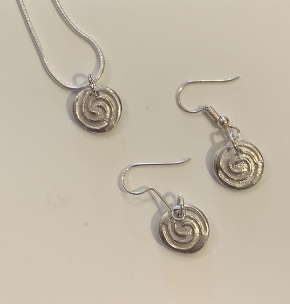 Earrings and pendant made by Linda