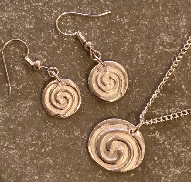 Swirly patterned earrings and matching pendant by Madeleine 26th October 2019