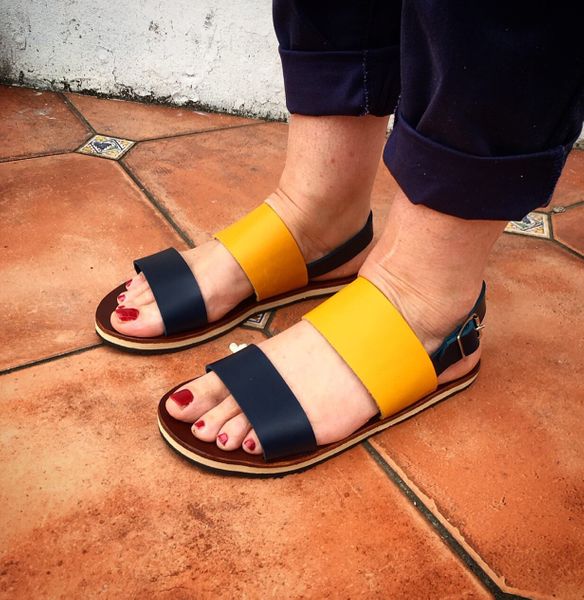 Blue and yellow sandals with a soft foam midsole