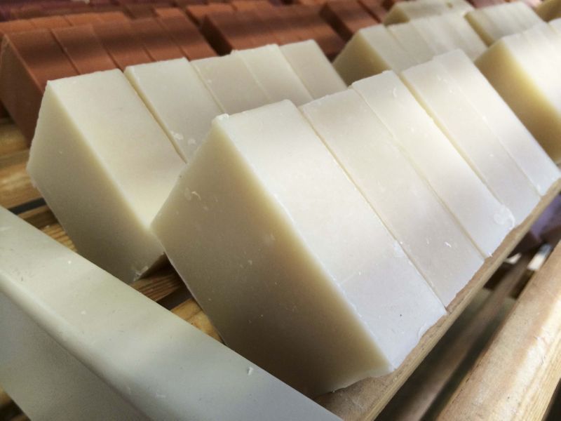 Cold process soap cut into bars for curing on the rack.