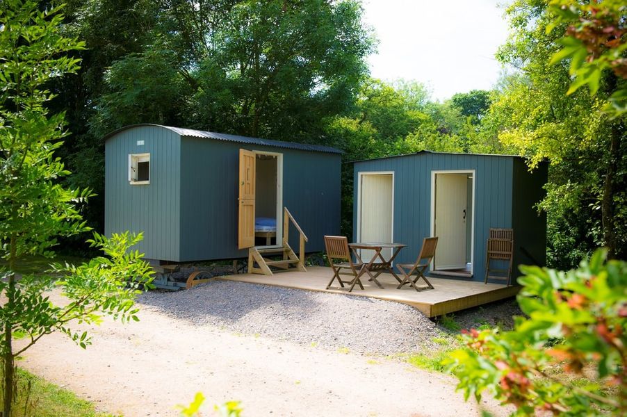 Shepherds huts by the lake.