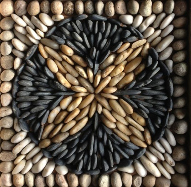 Pebble mosaic flower motif, Ilkley