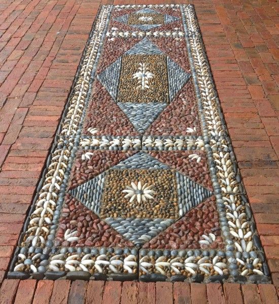 David James of Olicana Mosaics -Formal geometric pavement in a parterre garden.  Ilkley