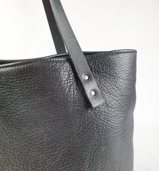 Learn leather skills such as riveting, stitching, skiving and cutting whilst crafting your own bespoke bag