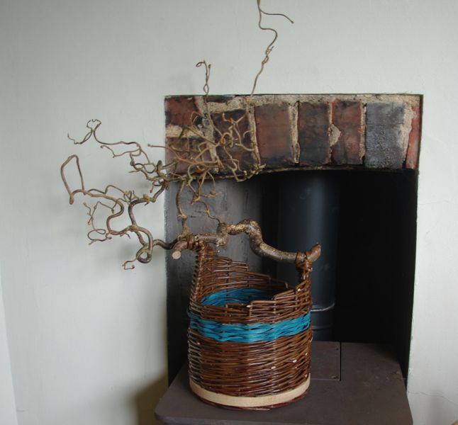 Willow, cane and a contorted hazel handle.