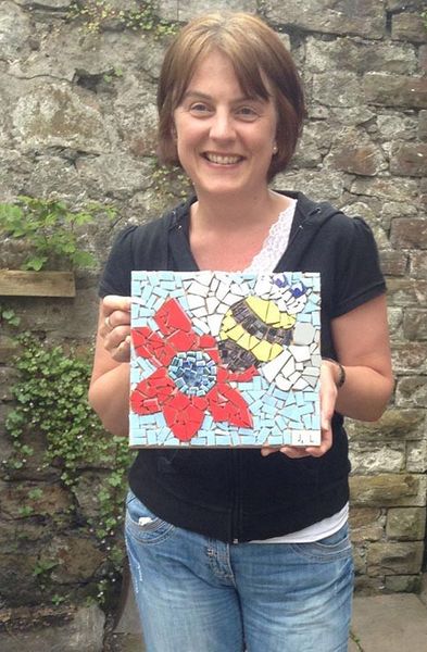  Another happy workshop attendee mosaic maker with her first mosaic!
