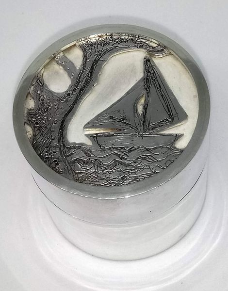 Silver box with etched and pierced decoration on lid by Tricia Boateng, 2020