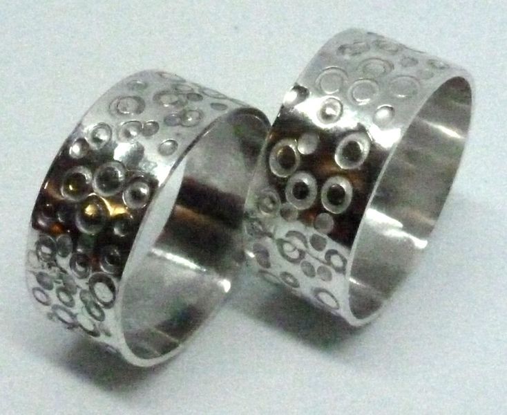 Matching silver wedding rings by Karl and Sue Traylor 2019