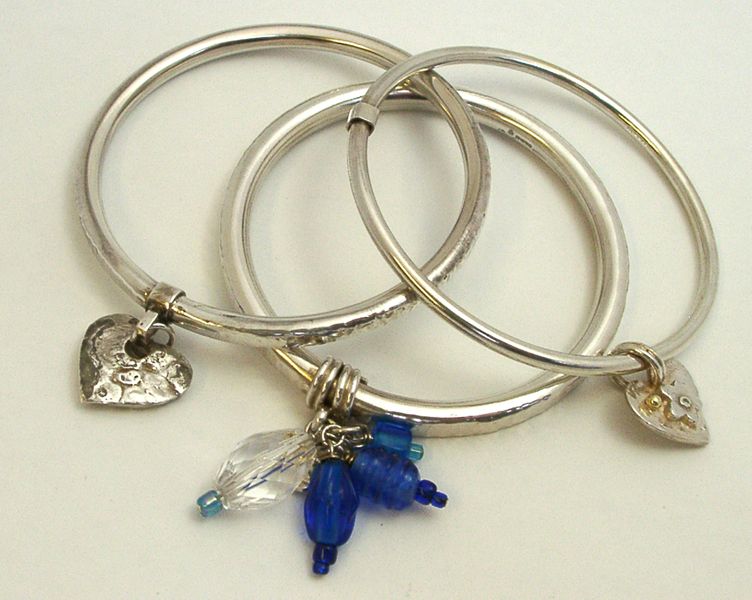 Silver bangles by Annette Whitley