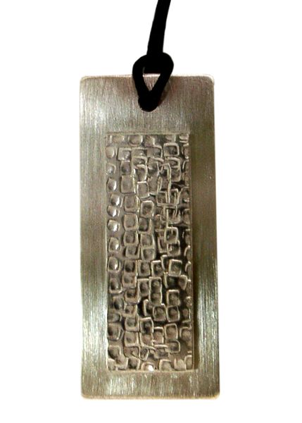 Silver punch textured pendant by Annette Whitley