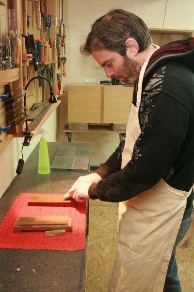 Paul sharpening his plane blade on a water stone