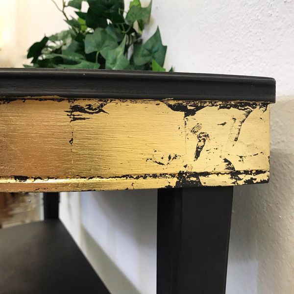 Gold leaf applied to a small console table