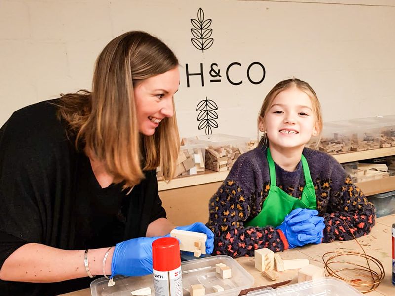 Mum and daughter enjoying quality time working together at an Ash & Co. Workshops Mini-Maker session