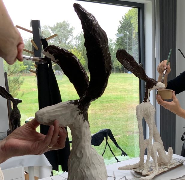 Painting the head & ears of large hares on a 1 day workshop (guests stayed a little later to finish this stage of a large hare)