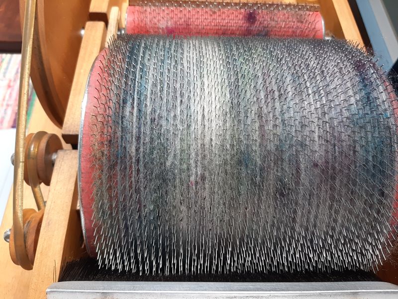 Using a drum carder