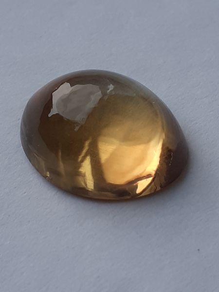 A Citrine cabochon cut by Juliette S. during her tuition. :)