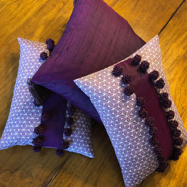 Scatter cushions in purple & cream linen & silk texture mix with pom pom trim