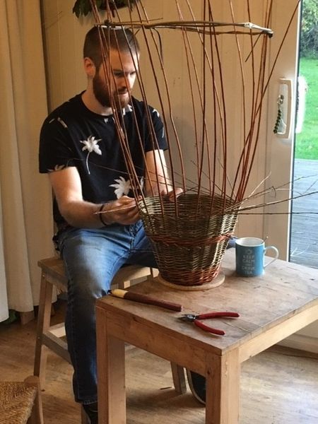 Student making a basket on a SalixArts course in the studio at Blacksmith Cottage. Nearly finished!