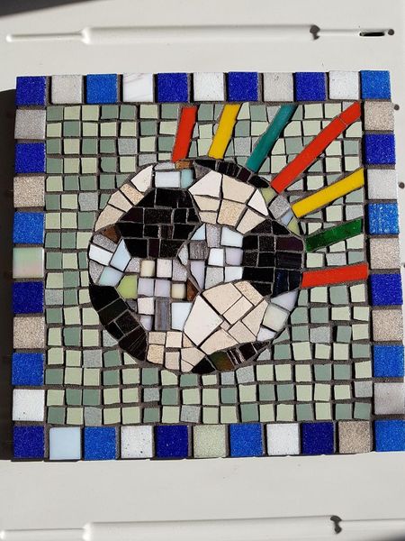 Football mosaic in glass and unglazed ceramic tiles