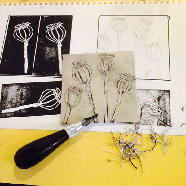 Learning how to create and cut a unique design on lino printing workshop in Edinburgh.