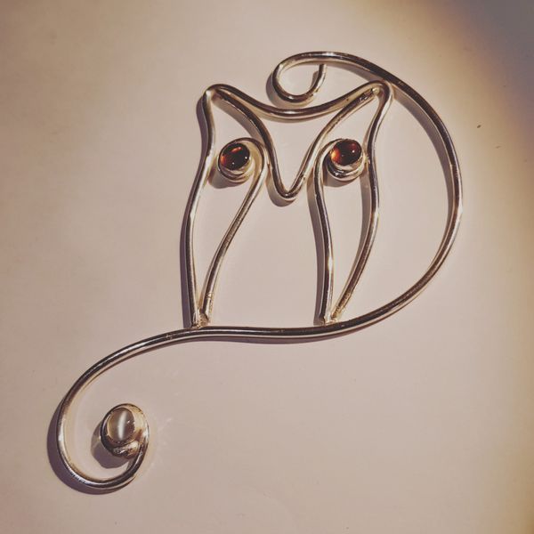 Statement owl necklace with two amber stone settings and a Moonstone