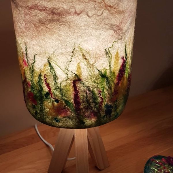 A felted lampshade with a grasslands theme-Claire Priestley.