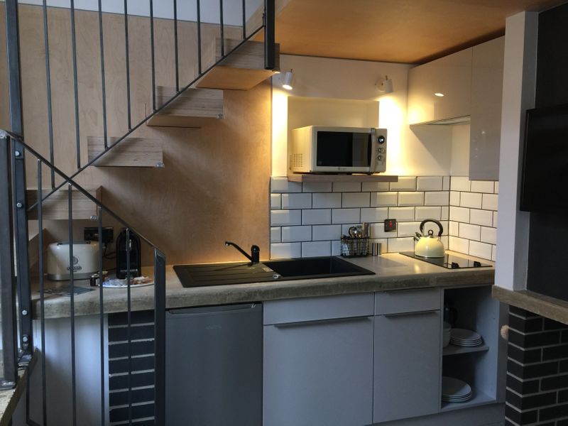 Fully equipped Kitchenette and cosy living area.
