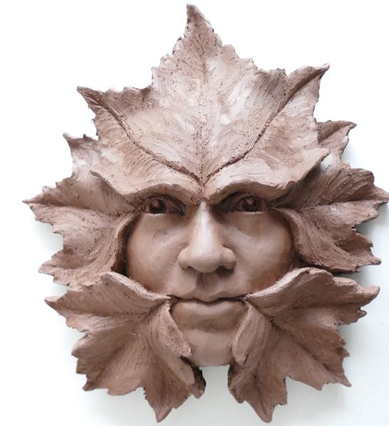 Green man clay sculpture example