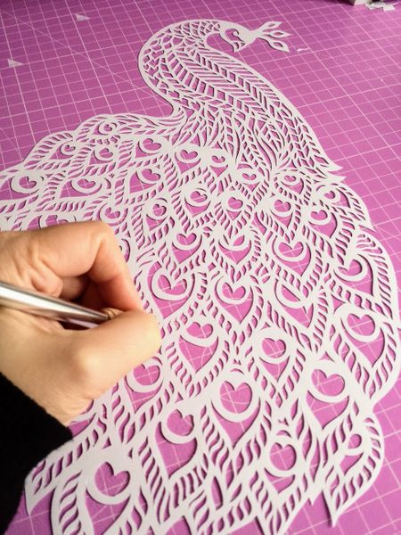 papercutting the peacock design