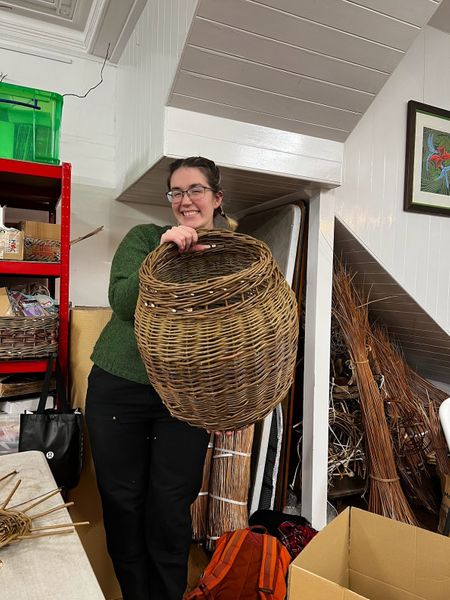 student with log basket