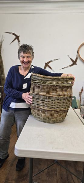 student with log basket
