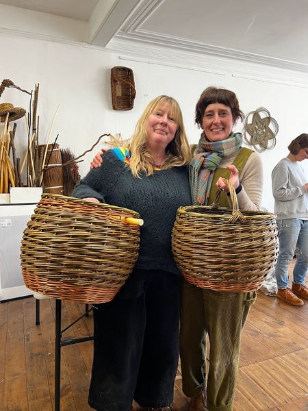 students with large baskets