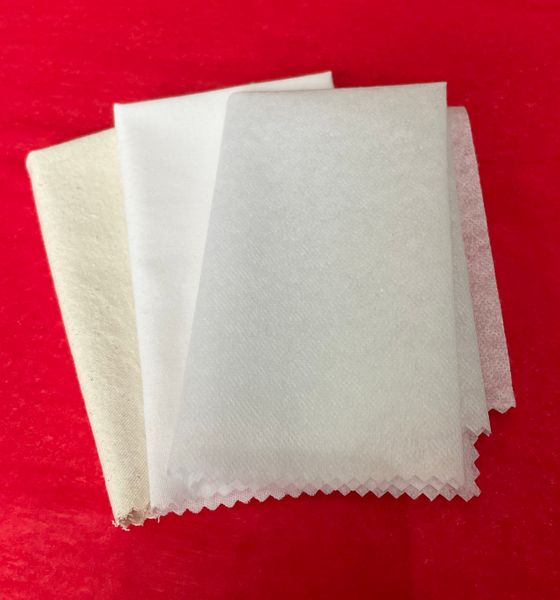 Kit contents: plain fabric for the lining and the back of the pocket, and some interfacing.