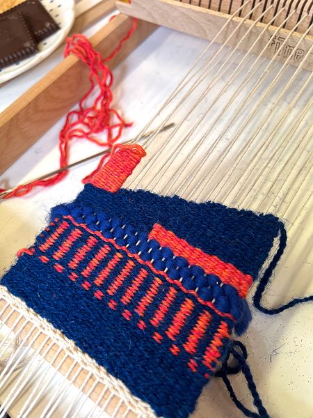 Student weaving: Vertical stripes; Creating shapes