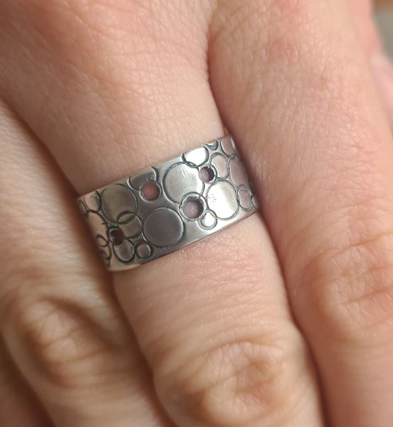 Stamped and drilled ring