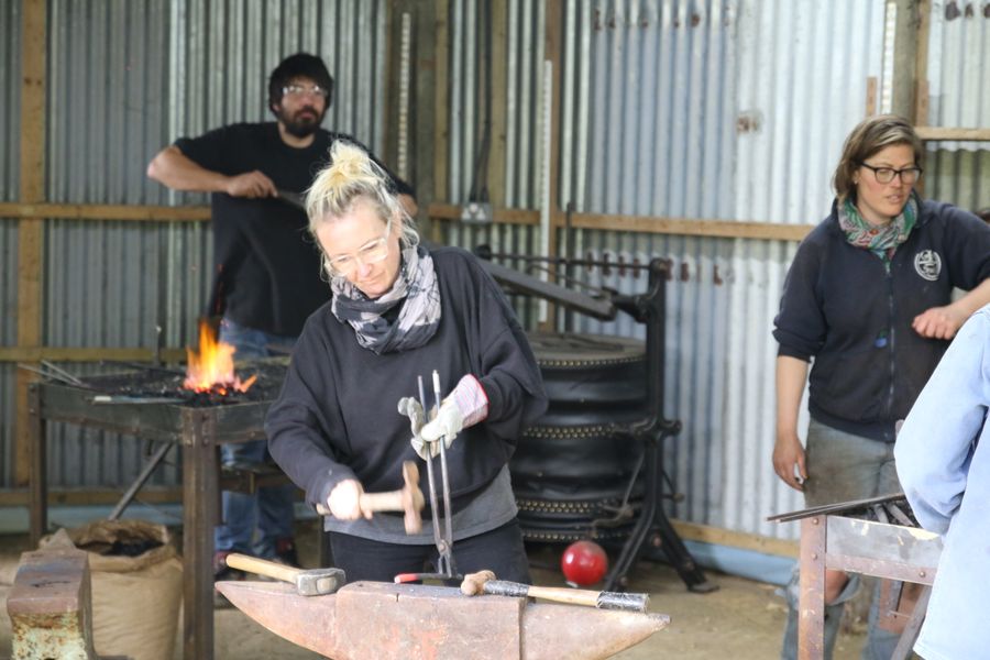 Forging and Bean working the bellows