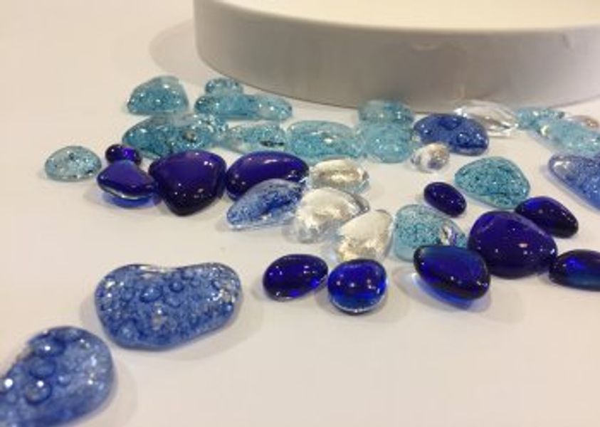 Fused glass nuggets ready to be laid out to form a bowl