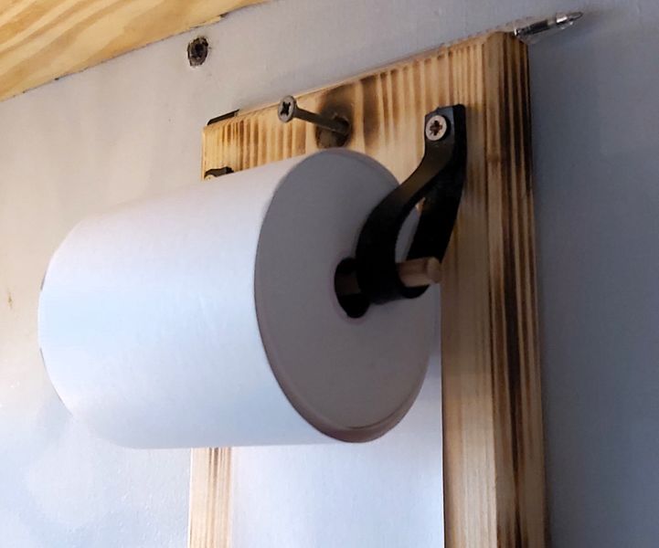 Running out of paper, simply add a new one by removing the dowling and adding your roll.