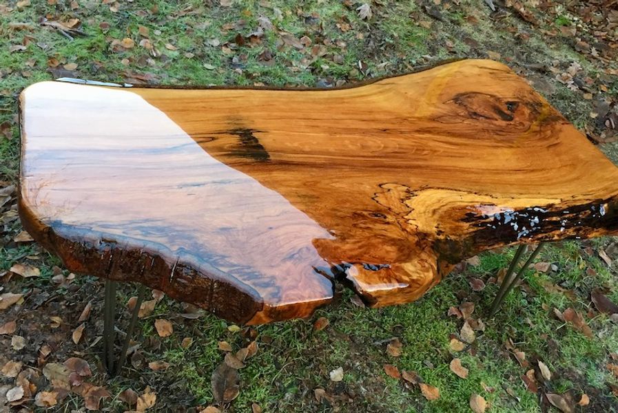 Beech coffee table with clear resin finish
