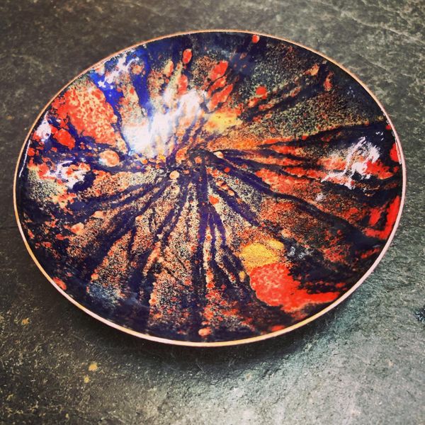 Enamelled bowl in complimentary colours, blue and orange, made by a first time at enamelling student!