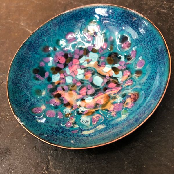 Enamelled blue bowl with pink and purple design Rainbow Glass Studios N16 0JL