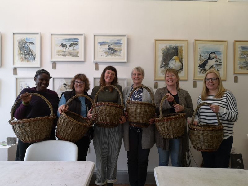 Students with Round Baskets