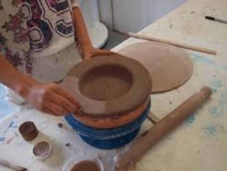 Making a ceramics press bowl Bronze Arts Award.