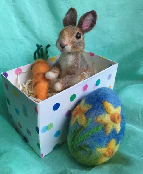 A baby wild bunny and carrot for that healthy Easter gift heart felt  