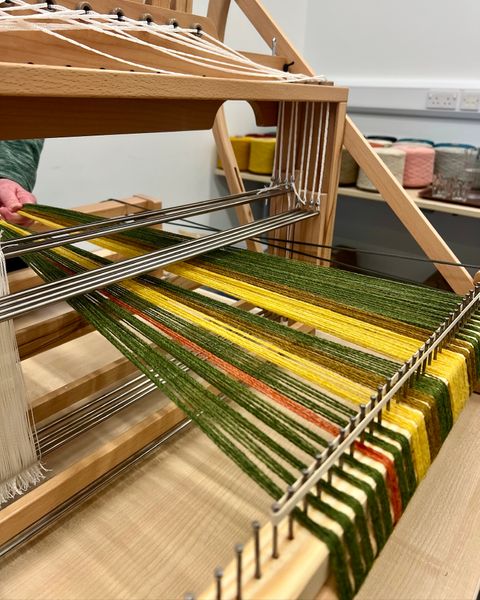 Getting the loom wound with a beautiful warp